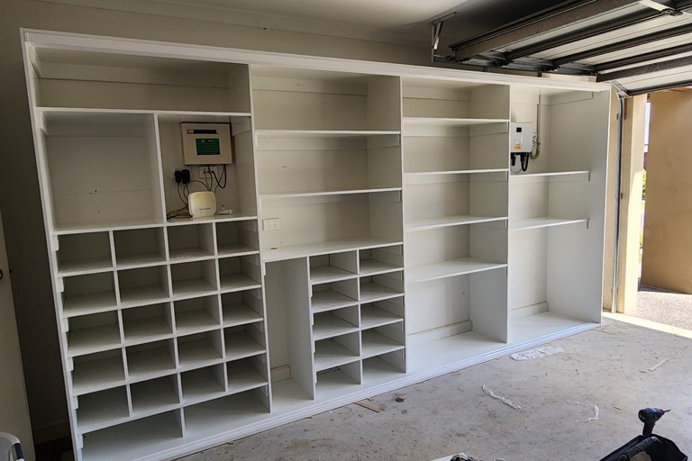 Cabinetmaker assembling a wardrobe
